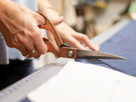 Behind the Seams: Exploring the Art and Craftsmanship of Our Clothing Manufacturing